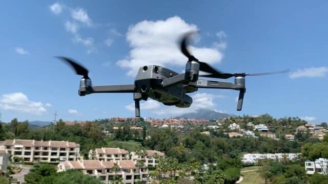 DJI Mavic drone in flight over Costa del Sol urbanisation – real estate drone photography and video services