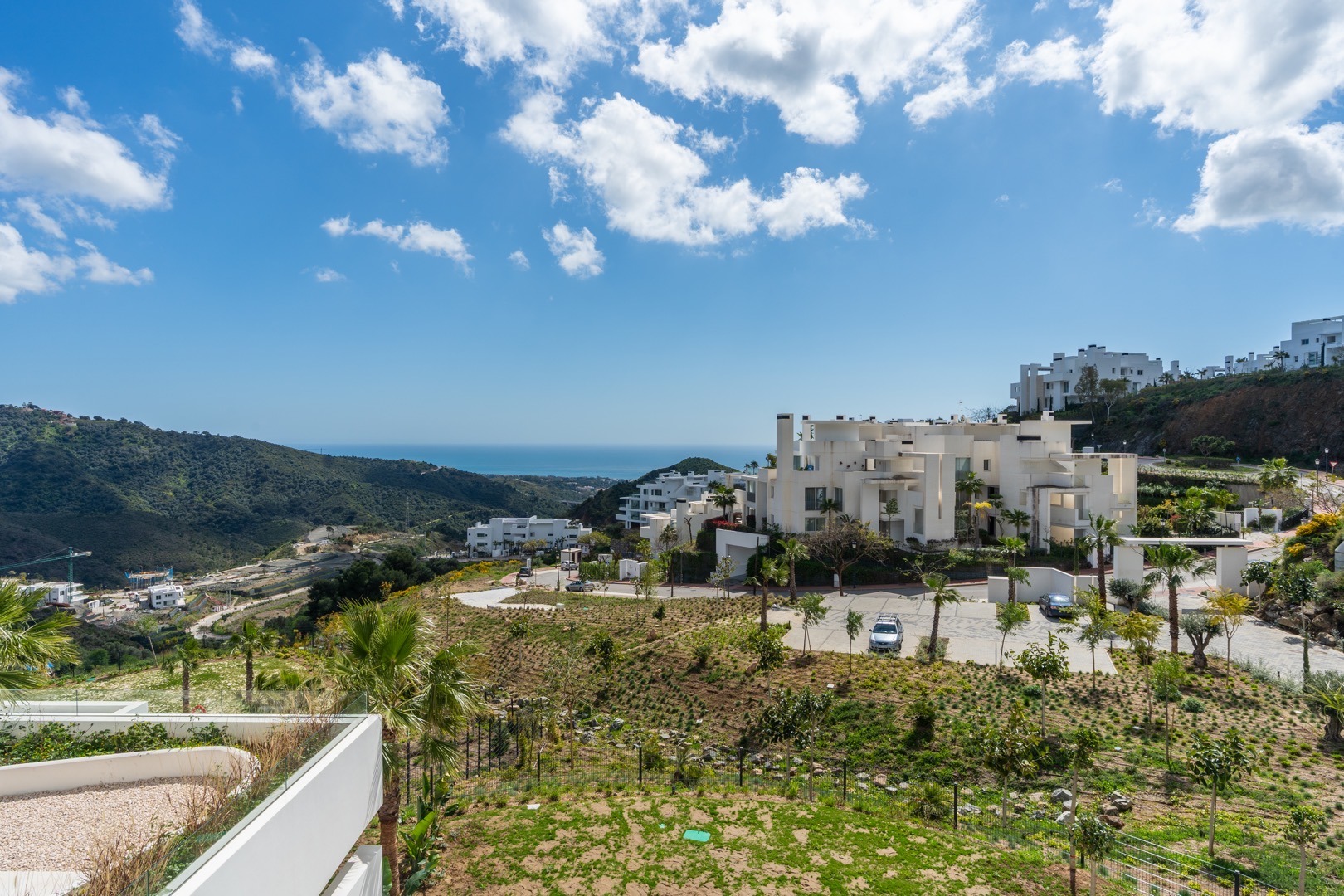 Aerial drone view of a hillside development in Benahavís – licensed real estate drone photography