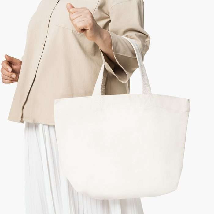 Natural cotton tote bag ready to carry a logo